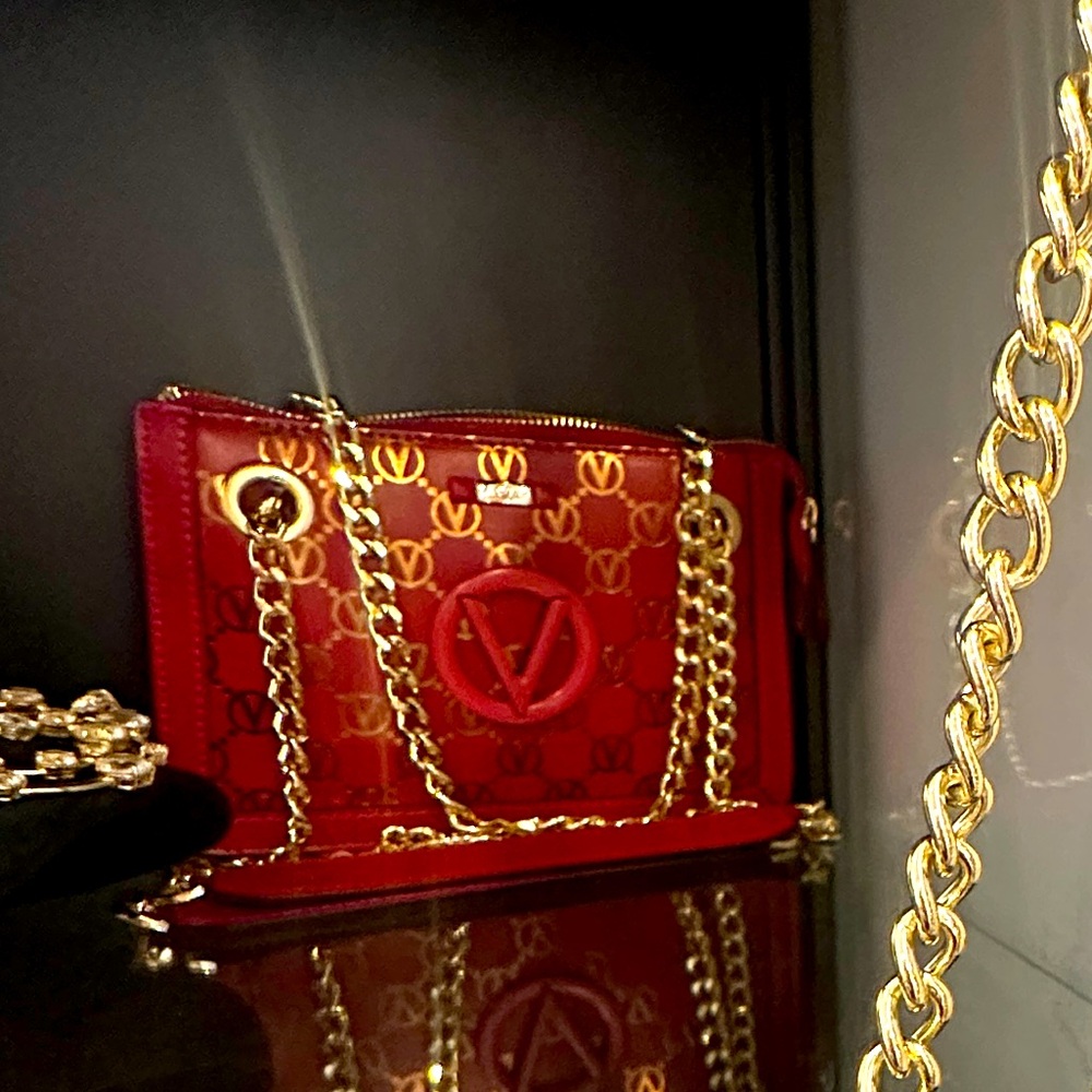 Valentino Luxury Handbag with Gold Accents